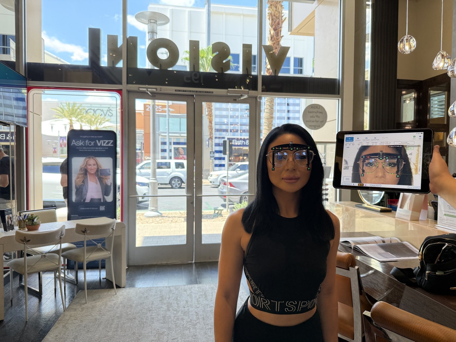 Vision by Amel storefront in Downtown Summerlin during a digital eyewear fitting