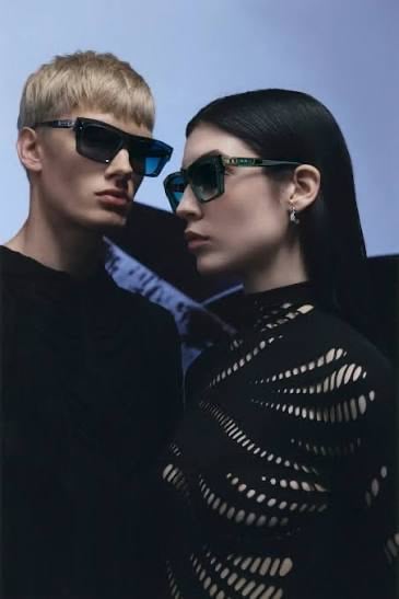 Two models in angular DITA sunglasses from the Vision by Amel collection