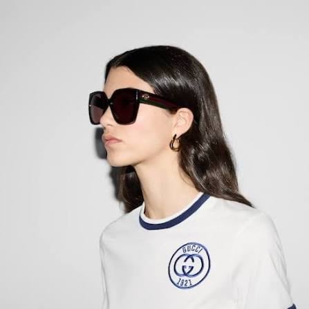 Model in oversized square Gucci sunglasses from the Vision by Amel gallery