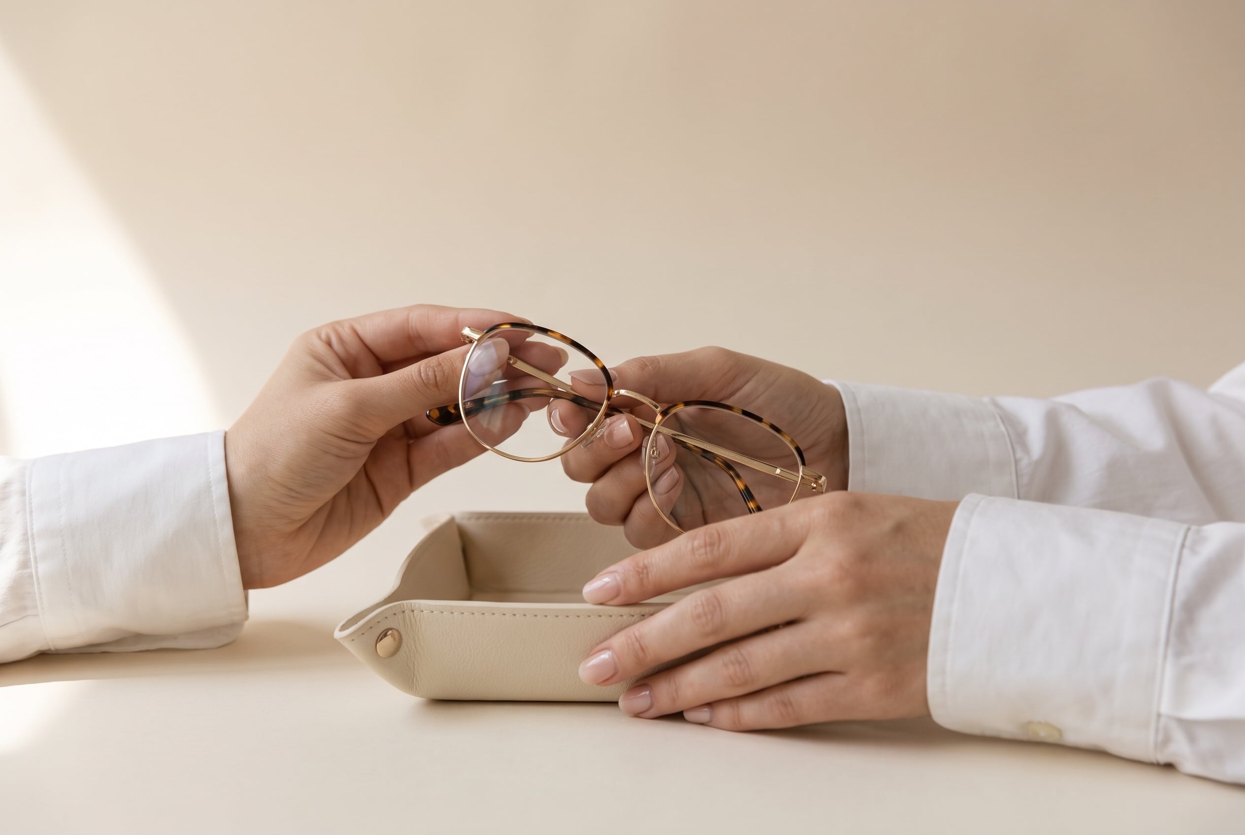 Luxury designer eyewear presented on a tray at the Vision by Amel gallery